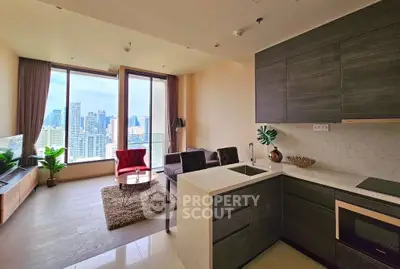 Modern open-layout living room with city view, stylish furniture, and sleek kitchen design.