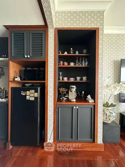 Charming kitchen nook with modern appliances and elegant cabinetry