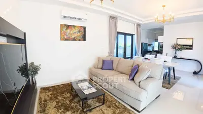 Spacious modern living room with elegant decor and open kitchen layout