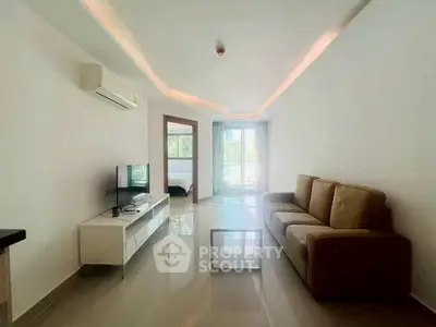 Modern living room with sleek furniture and natural light