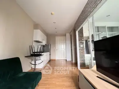 Modern apartment interior with sleek kitchen and cozy living area