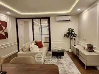 Stylish modern living room with elegant decor and cozy seating area