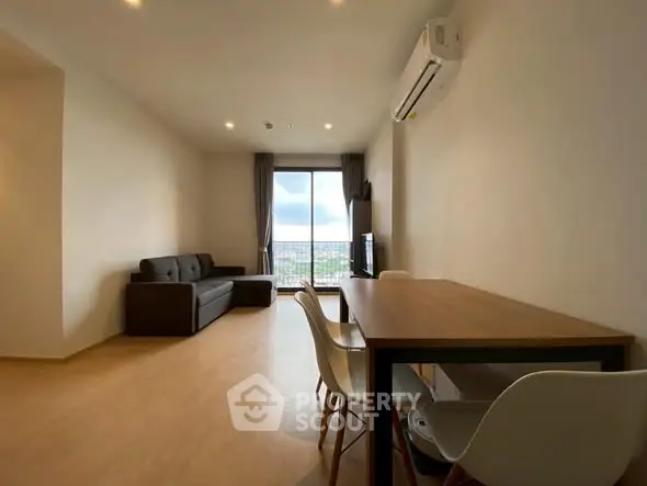 Modern living room with balcony view and minimalist furniture