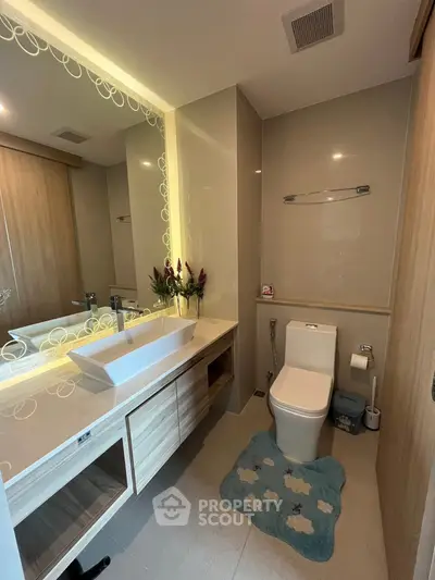 Modern bathroom with elegant vanity and stylish decor