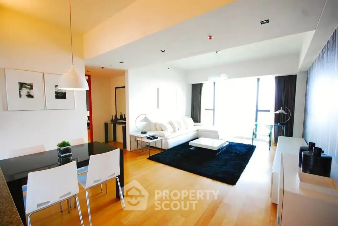 Spacious modern living room with elegant decor and natural light