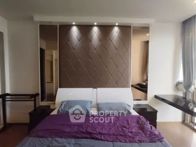 Luxurious modern bedroom with stylish headboard and elegant decor