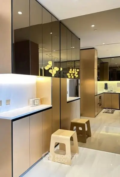 Luxurious modern kitchen with sleek cabinetry and stylish lighting
