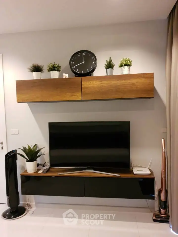 Modern living room with stylish TV setup and elegant decor