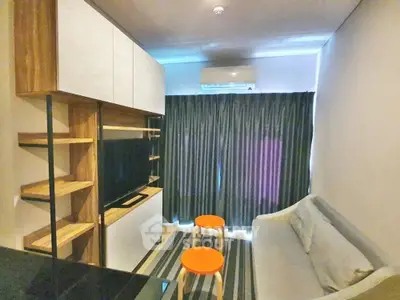 Modern living room with sleek furniture and air conditioning