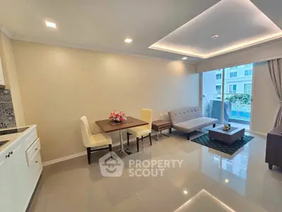 Modern living room with elegant furniture and natural light in a stylish apartment.