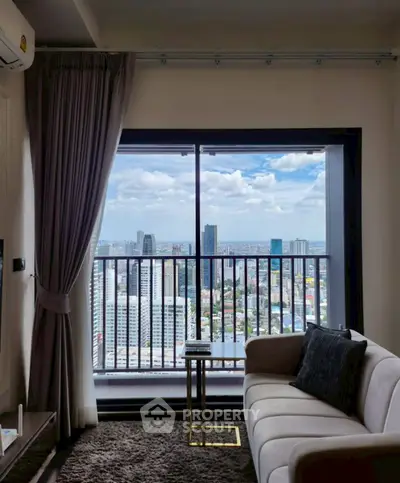 Modern living room with stunning city view from high-rise apartment balcony.