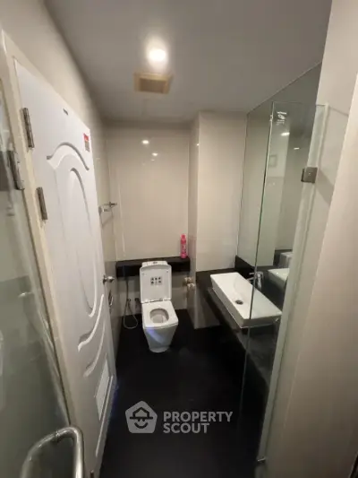 Modern bathroom with sleek design and glass shower enclosure