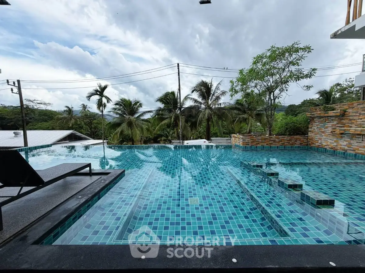 Luxurious infinity pool with stunning tropical views and modern design