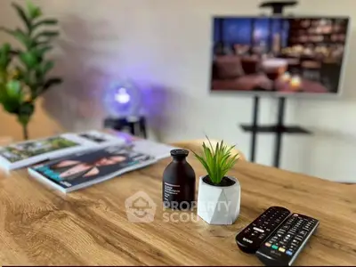 Modern living room with stylish decor and entertainment setup