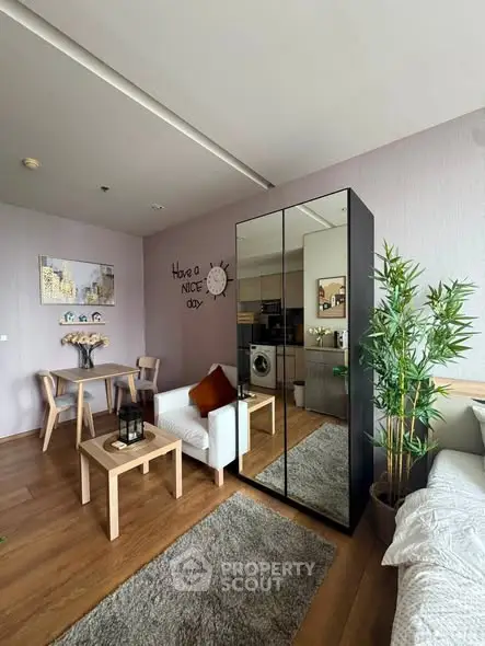 Modern living room with stylish decor and open kitchen layout