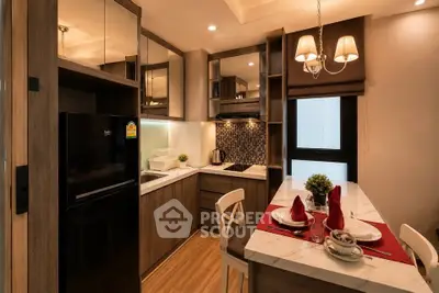 Modern kitchen with elegant dining area, featuring stylish cabinetry and ambient lighting.
