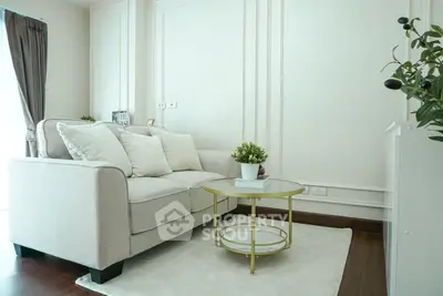 Chic and cozy living room with elegant sofa and stylish decor