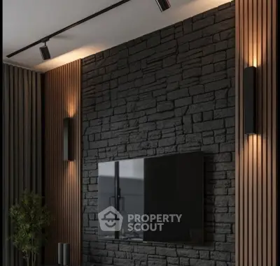 Modern living room with stylish stone accent wall and mounted TV