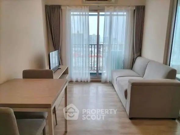 Modern living room with balcony view and minimalist furniture