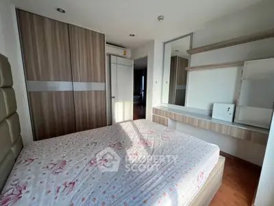 Modern bedroom with built-in wardrobe and stylish decor