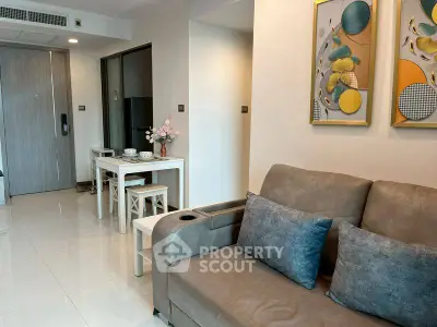 Modern living room with stylish decor and comfortable seating in a contemporary apartment.