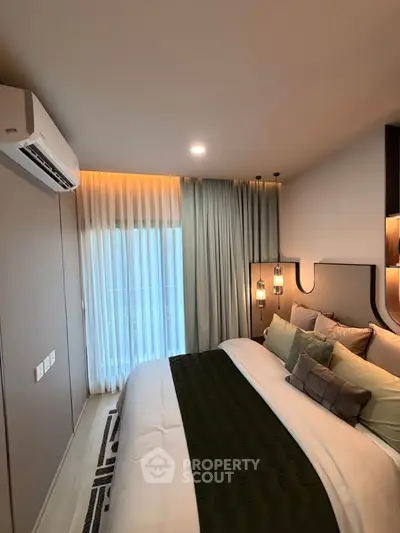 Luxurious modern bedroom with elegant lighting and stylish decor