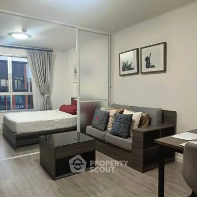 Modern studio apartment with stylish decor and natural light