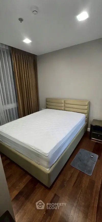 Modern bedroom with sleek design and cozy atmosphere