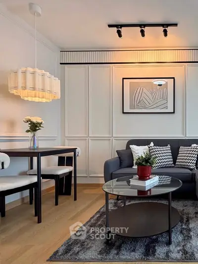 Stylish modern living room with elegant decor and cozy seating area.