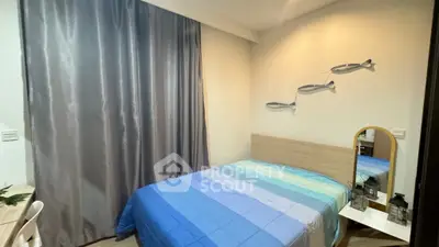 Cozy bedroom with modern decor and stylish fish wall art