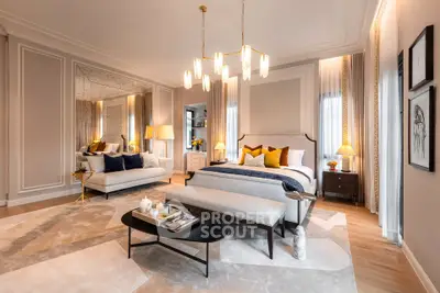 Luxurious bedroom with elegant decor, spacious layout, and modern lighting in a high-end property.