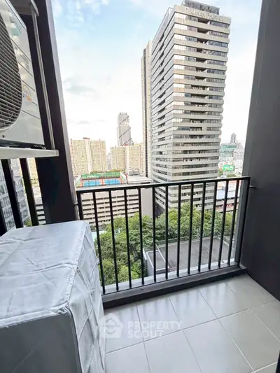 Modern balcony with city view in high-rise apartment