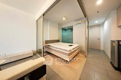 Modern bedroom with glass partition and minimalist design