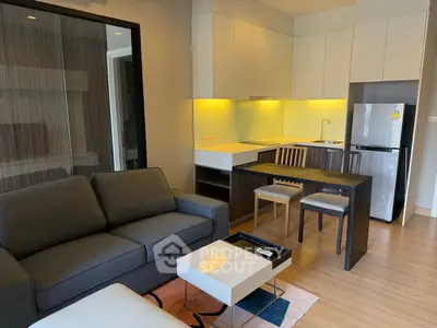 Modern apartment interior with cozy living room and sleek kitchen design