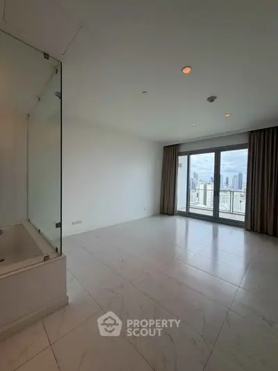 Spacious modern apartment with city view and elegant marble flooring