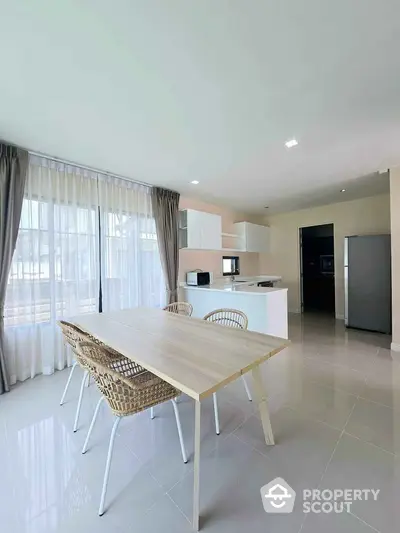 Spacious modern kitchen with open layout and natural light