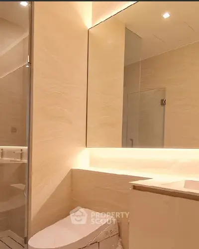 Luxurious modern bathroom with elegant lighting and sleek design