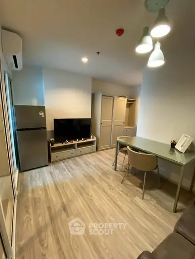 Modern living room with sleek furniture and stylish lighting