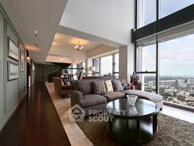 Luxurious living room with panoramic city views and elegant decor