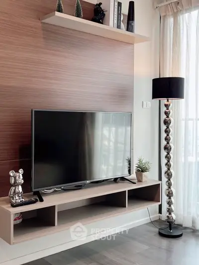 Modern living room with sleek TV stand and stylish decor