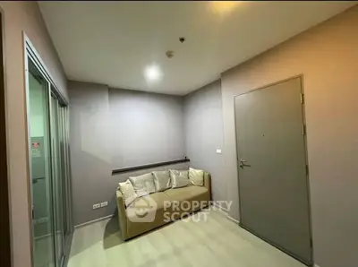 Cozy small living room with modern sofa and minimalist decor