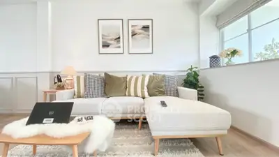 Modern living room with stylish decor and cozy seating area