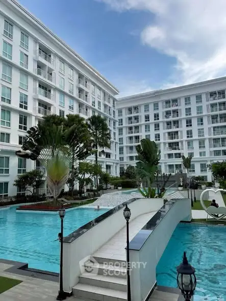 Luxurious residential complex with stunning pool and modern architecture