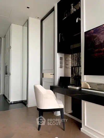 Modern study area with sleek desk and comfortable chair in luxury apartment