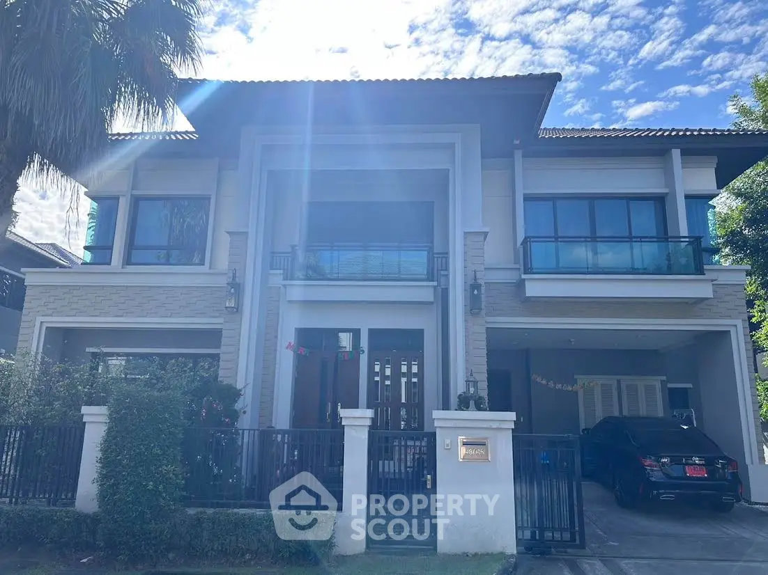 Stunning modern two-story house with large windows and sleek design, perfect for luxurious living.