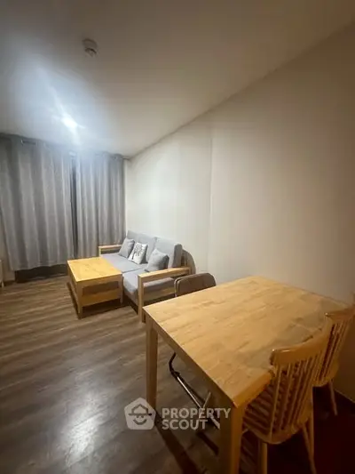 Cozy living room with wooden flooring and modern furniture