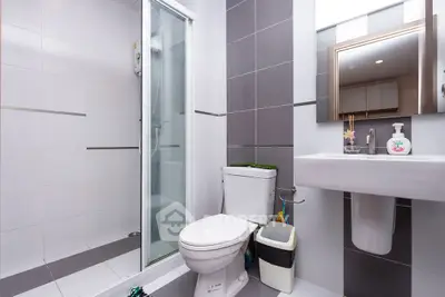 Modern bathroom with sleek shower and stylish fixtures