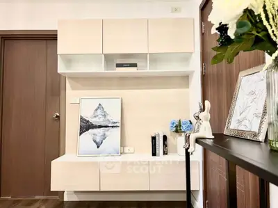 Stylish modern living room with elegant decor and wall-mounted storage