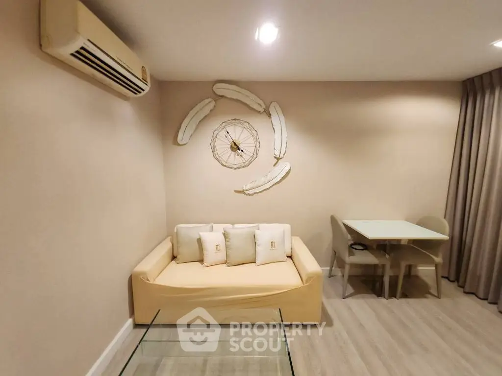 Cozy living room with modern decor and air conditioning