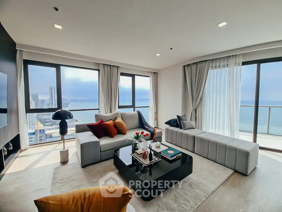 Luxurious living room with stunning ocean view and modern decor